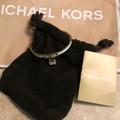 Michael Kors Jewelry | Charm Mk Bangle Bracelet Diamond | Color: Gold/White | Size: Os