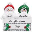 The Holiday Aisle® Snowmen on Wall Couple Hanging Figurine Ornament Plastic in Gray/Green/Red | 2.5 H x 2.75 W x 0.5 D in | Wayfair