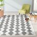 Black/White 65 x 0.47 in Area Rug - Mistana™ Castonguay Geometric Ivory/Black Area Rug Polypropylene | 65 W x 0.47 D in | Wayfair