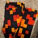 Lularoe Pants & Jumpsuits | Lularoe Tc Leggings | Color: Black/Orange | Size: Tc