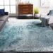 Blue/Gray 48 x 0.35 in Indoor Area Rug - Trent Austin Design® Mclawhorn Abstract Teal Area Rug Polypropylene | 48 W x 0.35 D in | Wayfair