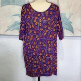 Lularoe Tops | Lularoe Irma Purple Pattern Blouse Size Xxs Nwt. | Color: Orange/Purple | Size: Xxs