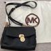 Michael Kors Bags | Michael Kors Black Leather Cross Body Purse With Gold Accents | Color: Black/Gold | Size: Os