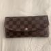 Louis Vuitton Bags | Louis Vuitton Damier Ebene Emilie Wallet | Color: Black | Size: Os