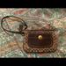 Coach Bags | Brown And Gold Coach Wristlet | Color: Brown/Gold | Size: Os