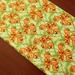 The Holiday Aisle® 8_Spooky Pumpkins Halloween Table Runner Cotton in Green | 144 W x 12 D in | Wayfair 01863E95B2D64A90BAC5A6A7C4F69E87