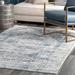 Blue/Gray 48 x 0.25 in Area Rug - Ophelia & Co. Eugenio Barbed Iris Medallion Rug Polyester/Polypropylene | 48 W x 0.25 D in | Wayfair