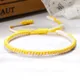 Bracelets en fil tressé jaune pour hommes et femmes accessoires de bijoux simples faits à la