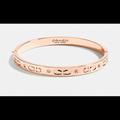 Coach Jewelry | Coach Kissing “C” Hinged Bangle Bracelet - Rose Gold | Color: Gold | Size: Os