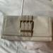 Michael Kors Bags | Michael Kors Off White Leather Clutch | Color: Cream/Gold | Size: Os