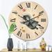 Designart 'Little Penguin Flying Stars and Planets I' Farmhouse Wood Wall Clock