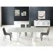 ASTOR dining table with polished stainless steel base.