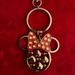 Disney Accessories | A Cute Disney Parks Minnie Mouse Keychain | Color: Gold/Red | Size: Os