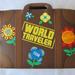 Disney Bags | Disney World Traveler Luggage Bag Pouch Small World | Color: Brown/Yellow | Size: 6.25" X 5.5"