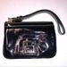 Dooney & Bourke Bags | Dooney And Bourke Gently Used Wristlet In Black Patent Leather | Color: Black | Size: Os