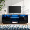 Orren Ellis Quayshun TV Stand for TVs up to 65" Wood in Black | 20.87 H x 57.08 W x 13.77 D in | Wayfair B95FCE22E7A140BD9260BE666F37A485