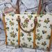 Tory Burch Bags | #Bagsavenue Yellow Green Floral Christmas Tory Burch Daisy Printed Jumbo | Color: Cream/Tan | Size: Width 16.5" Height 11.25" Depth 5.5"