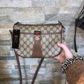 Gucci Bags | Gucci Sling Bag | Color: Brown/Gold | Size: 9x4x7