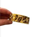 Coach Jewelry | Coach Animal Print Bangle | Color: Brown/Gold | Size: Os