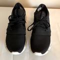 Adidas Shoes | Adidas Originals Black Tubular Sneakers With Speckled Sole | Color: Black/White | Size: 7.5