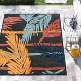 Blue/Orange 146 x 108 x 0.15 in Area Rug - Beachcrest Home™ Parley Floral Machine Made Power Loom Indoor/Outdoor Area Rug in Blue/Red/Orange | Wayfair