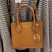 Michael Kors Bags | Michael Kors Mercer Medium Pebbled Leather Crossbody Bag | Color: Brown/Gold | Size: Medium