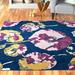 Blue/Navy 63 x 0.5 in Area Rug - Andover Mills™ Zabel Floral Navy Blue/Pink/Yellow Area Rug Polypropylene | 63 W x 0.5 D in | Wayfair