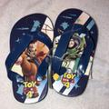 Disney Shoes | Dinsey/Pixar Toy Story 4 Toddler Flip Flops Sandals Nwt Size 5/6 | Color: Black/Blue | Size: 5.5bb