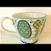 Anthropologie Dining | Anthropologie Footed Ceramic Coffee Mug Ornate Crest Green And Yellow | Color: Blue/Green | Size: Os
