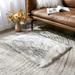 White 118.16 x 78.79 x 2.4 in Area Rug - Everly Quinn Levani Faux Sheepskin Area Rug/Faux Fur | 118.16 H x 78.79 W x 2.4 D in | Wayfair