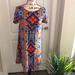 Lularoe Dresses | Lularoe Carly Dress. Nwot | Color: Orange/Purple/Yellow | Size: Xs