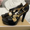 Michael Kors Shoes | Michael Kors Black Patent Leather W/ Gold Platform Heels | Color: Black/Gold | Size: 5.5