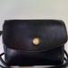 Coach Bags | Coach Chrystie Black Small Crossbody Bag With Brass Spring-Back Closure | Color: Black/Gold | Size: Os
