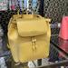 Kate Spade Bags | Kate Spade Darcy Flap Backpack | Color: Yellow | Size: Small
