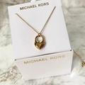 Michael Kors Jewelry | Brand New Michael Kors Gold Heart With Rhinestone | Color: Gold | Size: Os