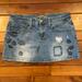 American Eagle Outfitters Skirts | American Eagle Denim Distressed Embroidered Mini Skirt 12 | Color: Blue | Size: 12