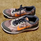 Nike Shoes | Nike Flex Rn Women's Running Sneakers Camo | Color: Gray/Orange | Size: 7.5