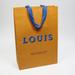 Louis Vuitton Party Supplies | Louis Vuitton "Louis" Logo Shopping Bag/Gift Bag Orange 14" X 9 3/4" X 4 1/4" | Color: Orange | Size: 14" X 9 3/4" X 4 1/4"