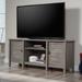 Andover Mills™ Hetrick TV Stand for TVs up to 65" Wood in Brown | 24.65 H in | Wayfair 86B53B2FC7284726ADD52338DB07BDAA