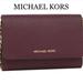 Michael Kors Bags | Michael Kors Jet Set Travel Medium Phone Xbody | Color: Gold/Purple | Size: Os