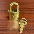 Louis Vuitton Accessories | Louis Vuitton Cadena Brass Padlock & Key #309 | Color: Gold | Size: Os