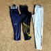 Under Armour Other | Bundle Of Under Armour Pants . Size Medium | Color: Black/White | Size: Medium