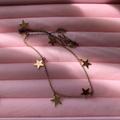 Brandy Melville Jewelry | Brandy Melville Gold Star Necklace | Color: Gold | Size: Os