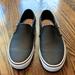 Vans Shoes | Cans Women’s Black Perforated Leather Slip On Tennis Shoes | Color: Black/White | Size: 7.5