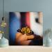 Rosalind Wheeler Black & Yellow Butterfly On Persons Hand - Wrapped Canvas Painting Canvas in Blue/White | 12 H x 12 W x 2 D in | Wayfair