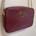 Michael Kors Bags | Michael Kors Leather Merlot Crossbody Bag With Gold Detailing | Color: Gold | Size: Os