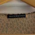 Brandy Melville Tops | Brandy Melville Cheetah Print Wrap-Around Crop Top | Color: Black/Tan | Size: One Size - Fits S Or M