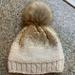 Anthropologie Accessories | Gold & Beige W Faux Pompom Hat | Color: Cream/Gold | Size: 6mos-24mos