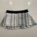 Lululemon Athletica Skirts | Black And White Lululemon Classic Tennis Skort | Color: Black/White | Size: 10