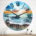 Designart 'Sunset Over The Sea With Blue And Orange Sky' Nautical & Coastal wall clock